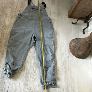 XXL overalls. Very generous. Would say these could fit up to 3x easily